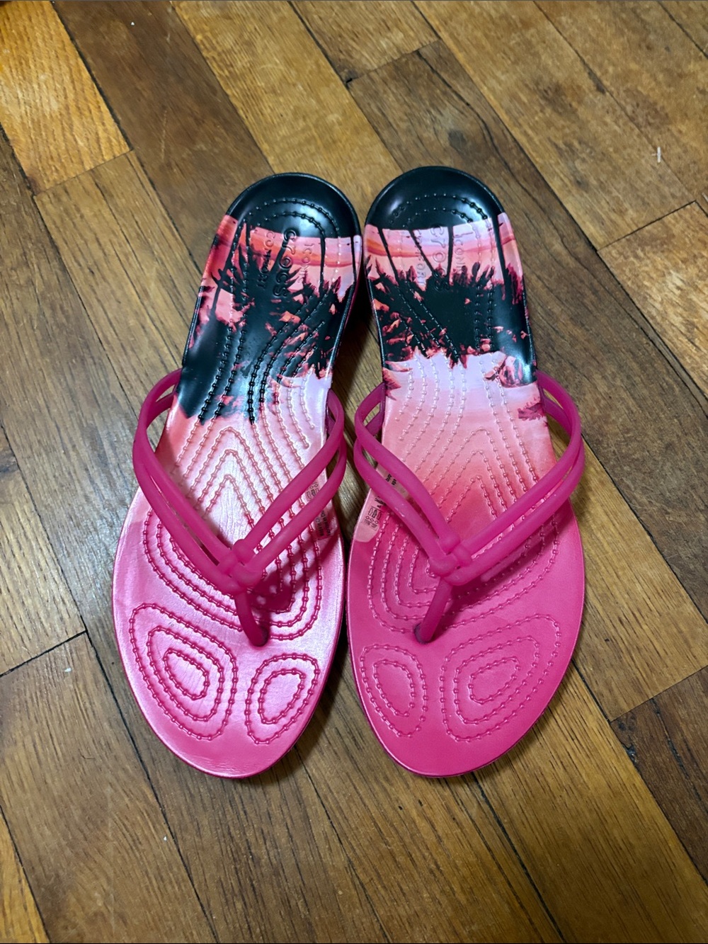 CROCS NWOT Pink Black Tropical Print Flip Sandals